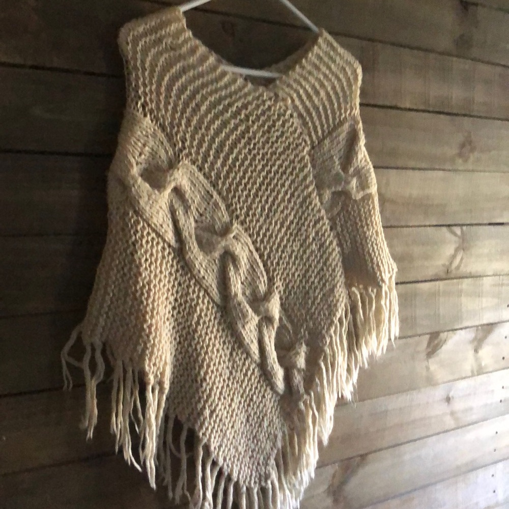 Cable knit poncho